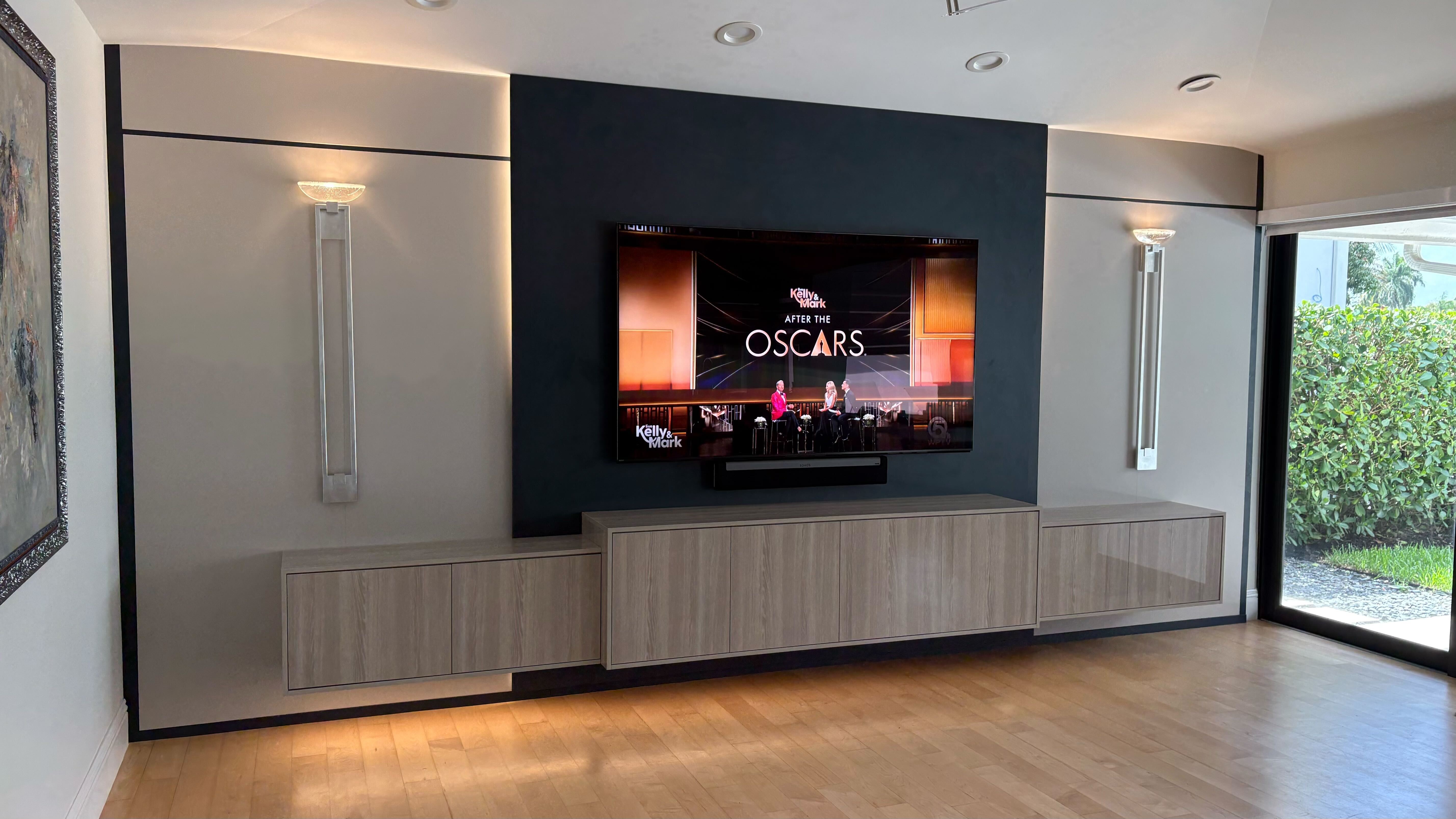 Custom media wall with floating cabinetry